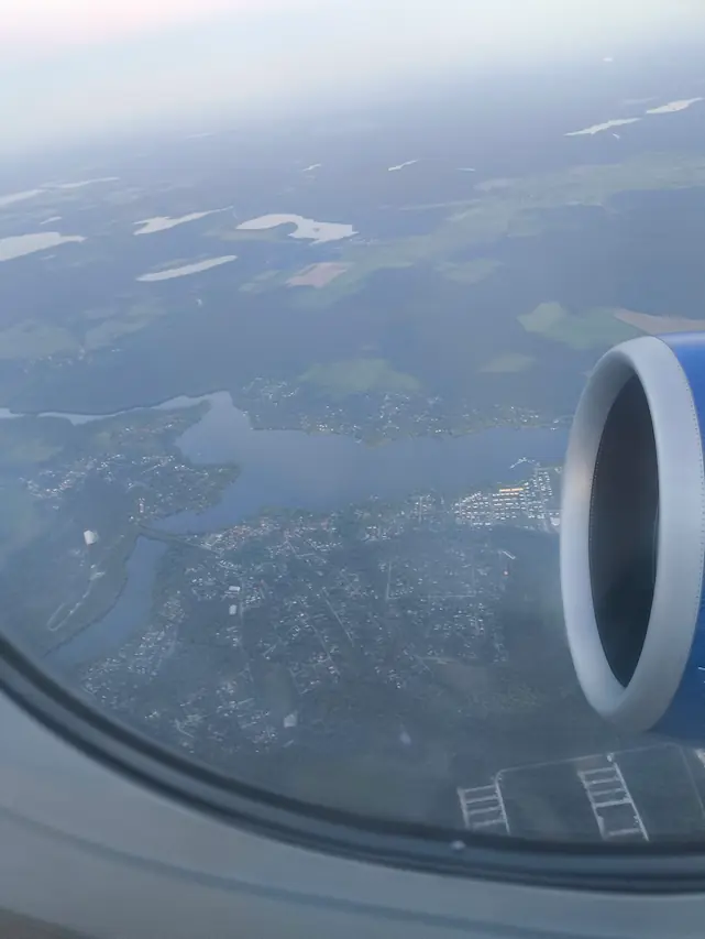 photo of the airplane window above Berlin